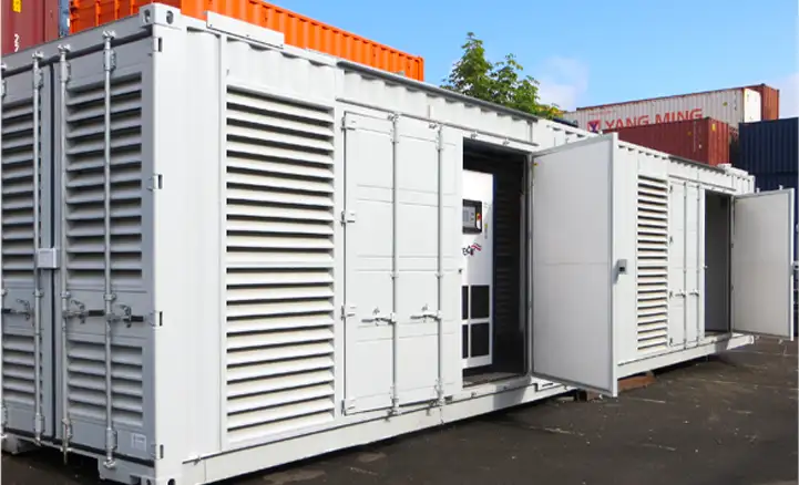 Large white containerised generator or compressor enclosure with louvred ventilation panels, side access doors, and integrated control panel, designed for industrial power or air system housing.