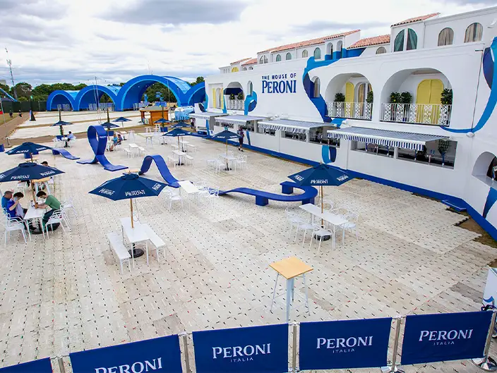 A Mediterranean-style event installation branded as 