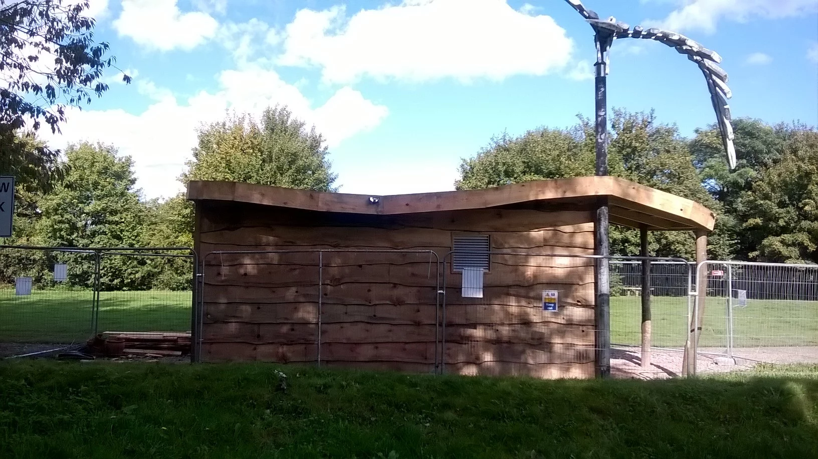 Wooden hut with metal air vent