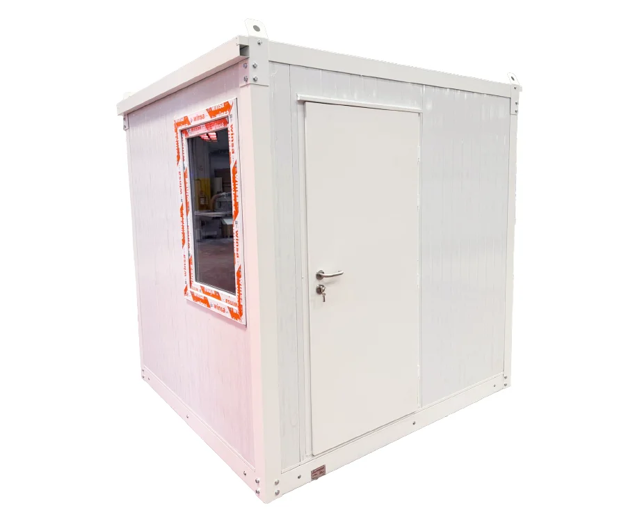 A compact, white modular container unit with a flat roof, a single door with a lock, and a window on the left side that is partially covered with protective tape.