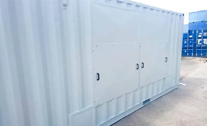 Large white container with wide double access hatches on the side for easy equipment maintenance and servicing.